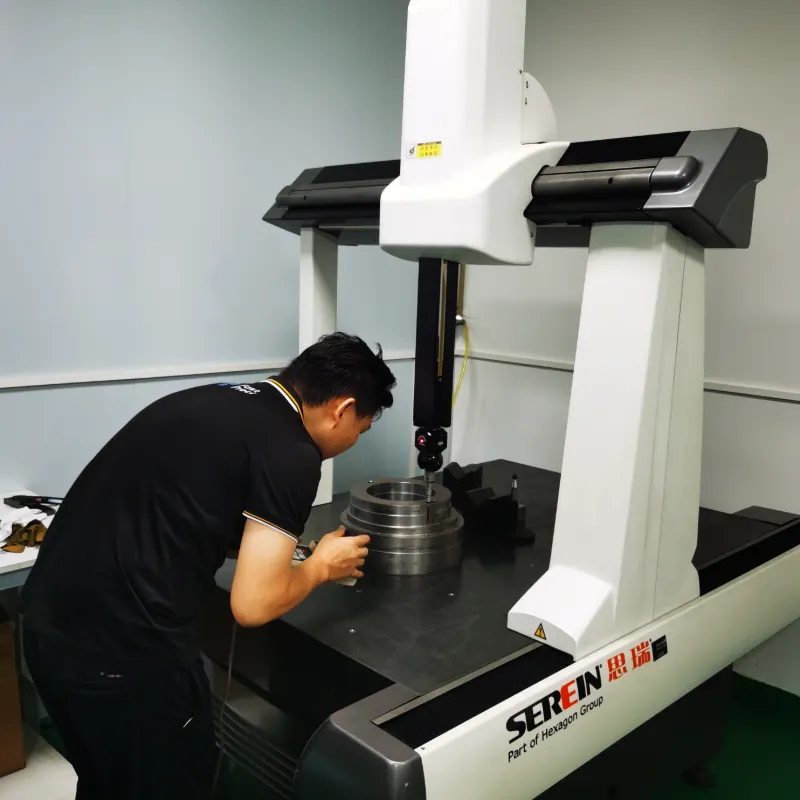 Coordinate measuring machine testing custom machined parts